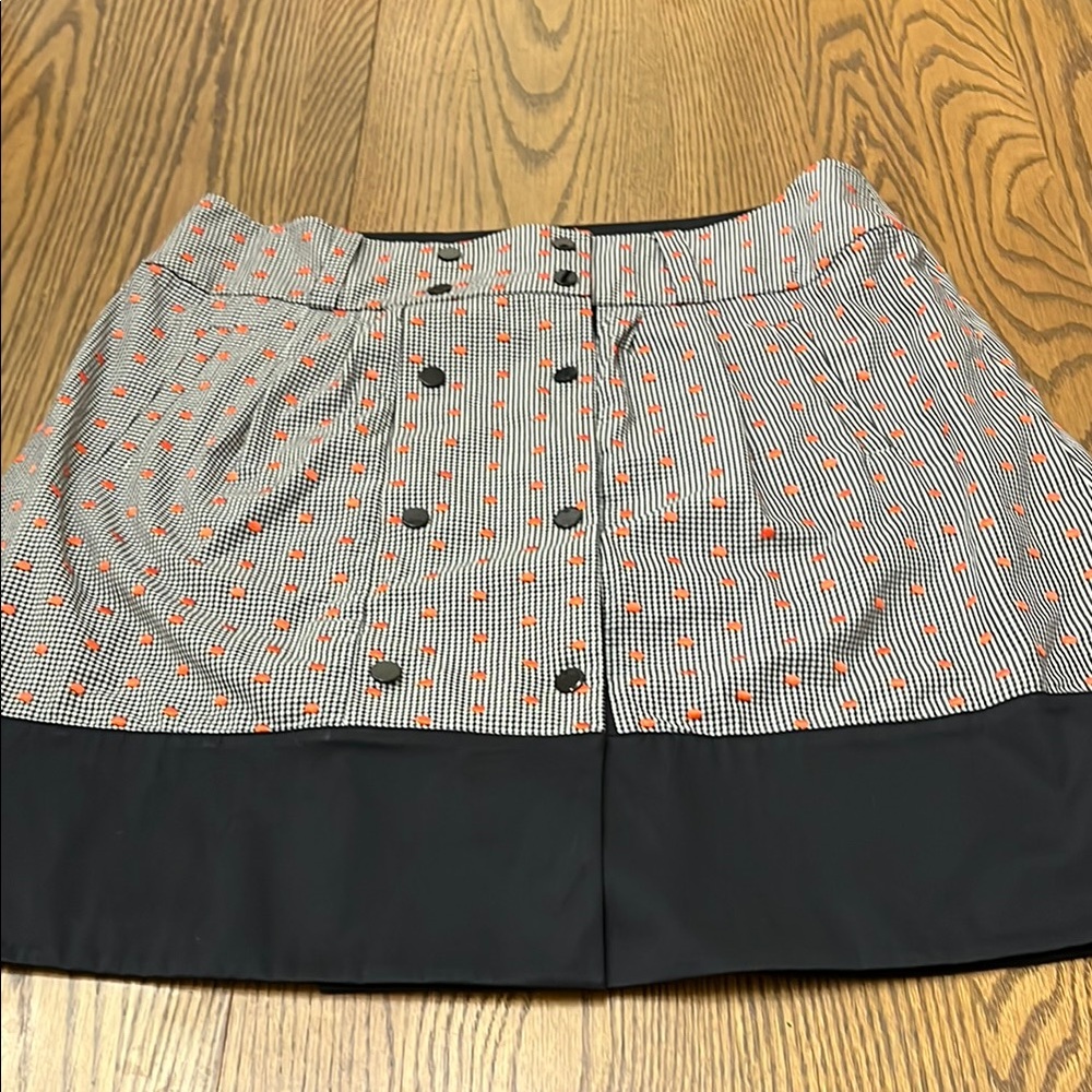 Carlisle Black and White Mini Skirt with Orange Dot Accents